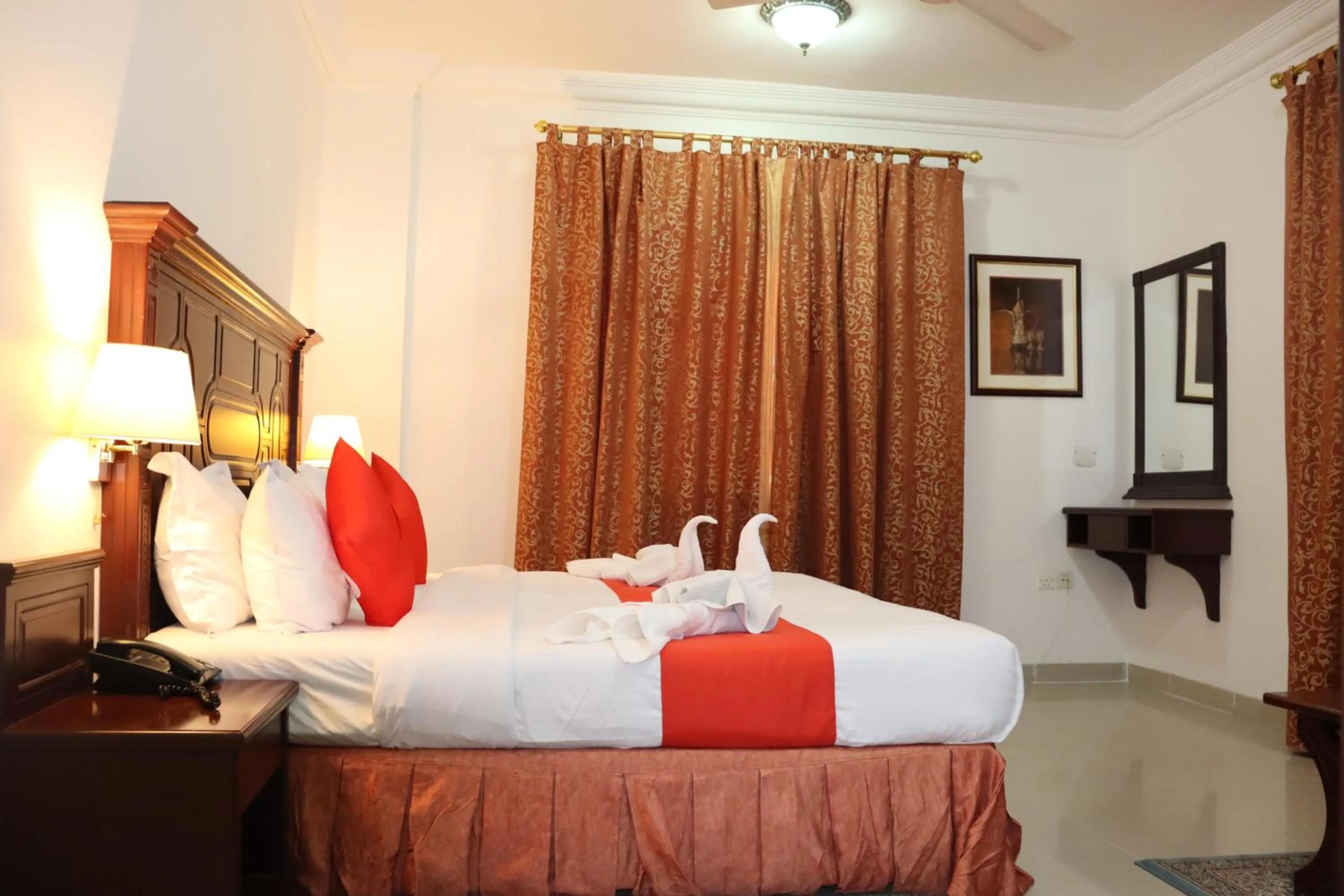 Bed in Dahlia Sohar Hotel Apartments