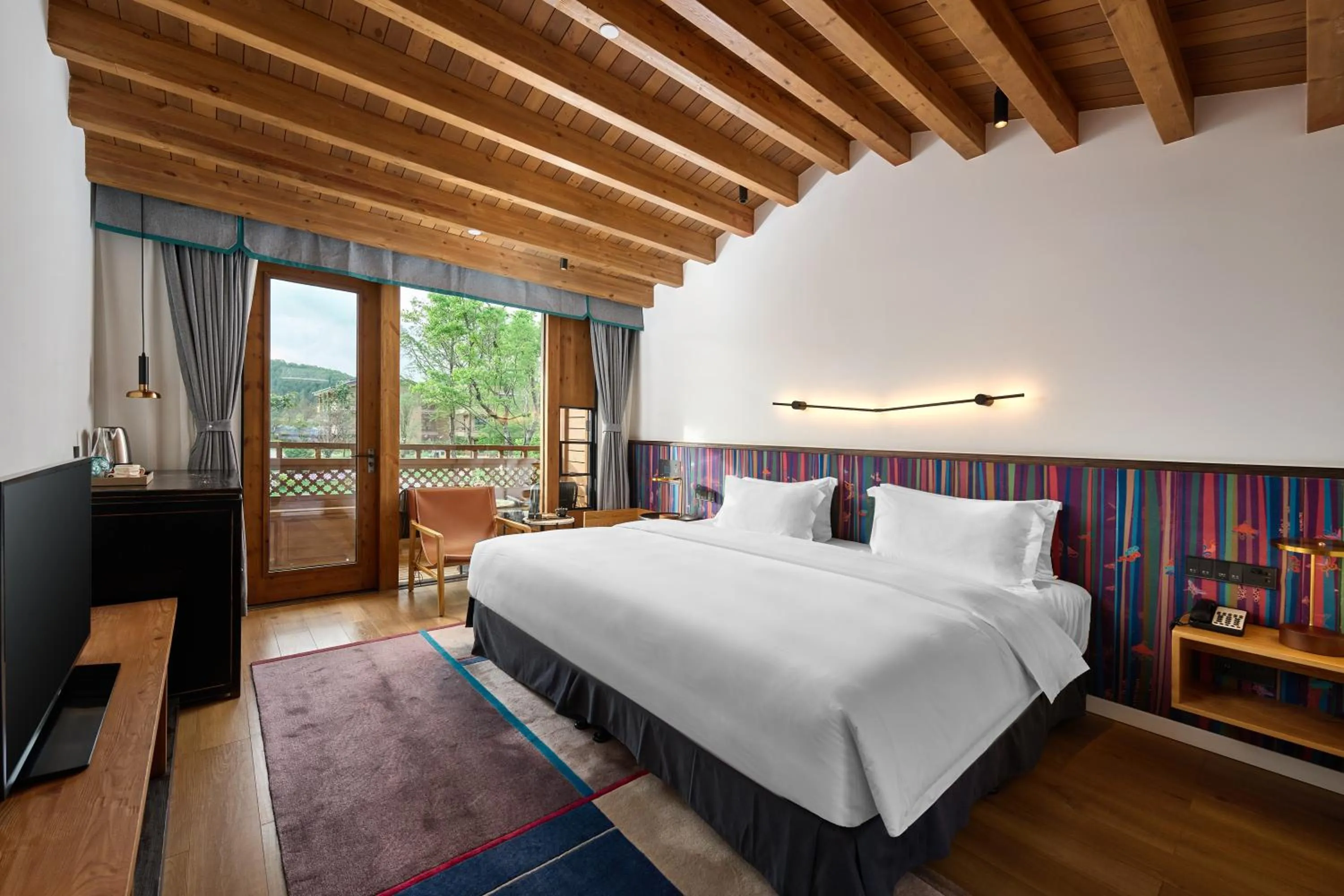 Bed in Hotel Indigo Lugu Lake by IHG