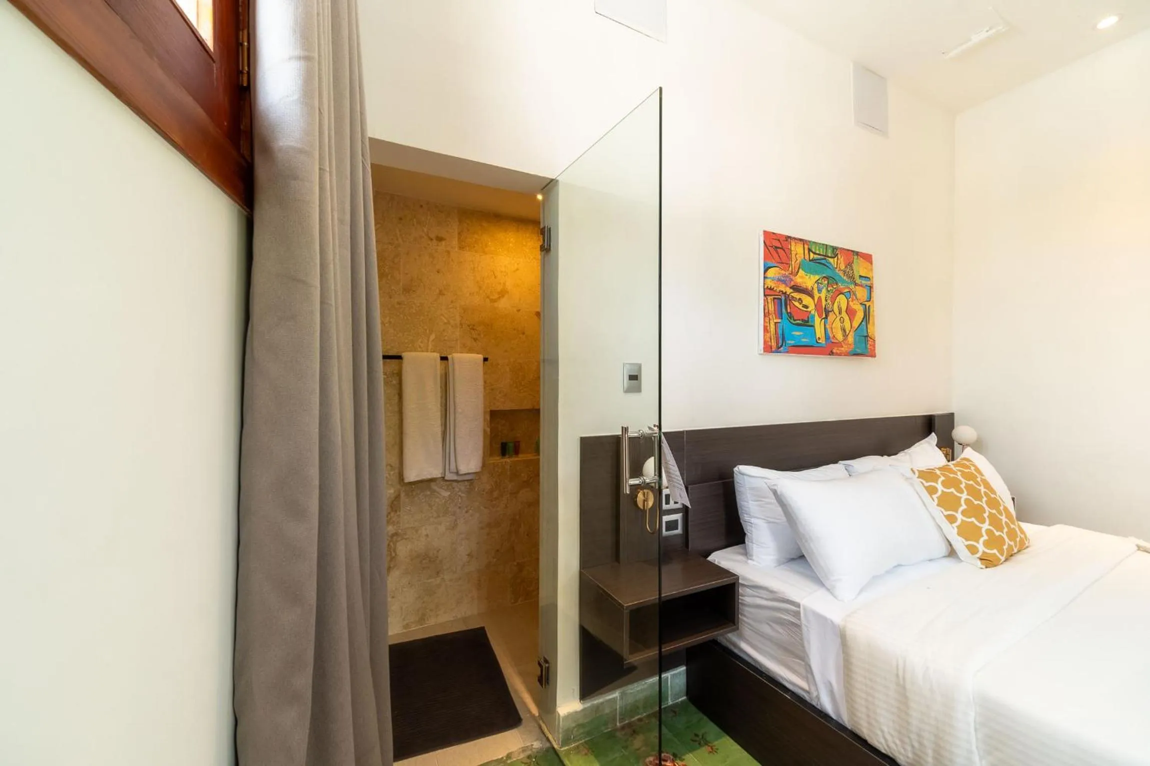 Photo of the whole room, Bed in Empyrean Art Deco