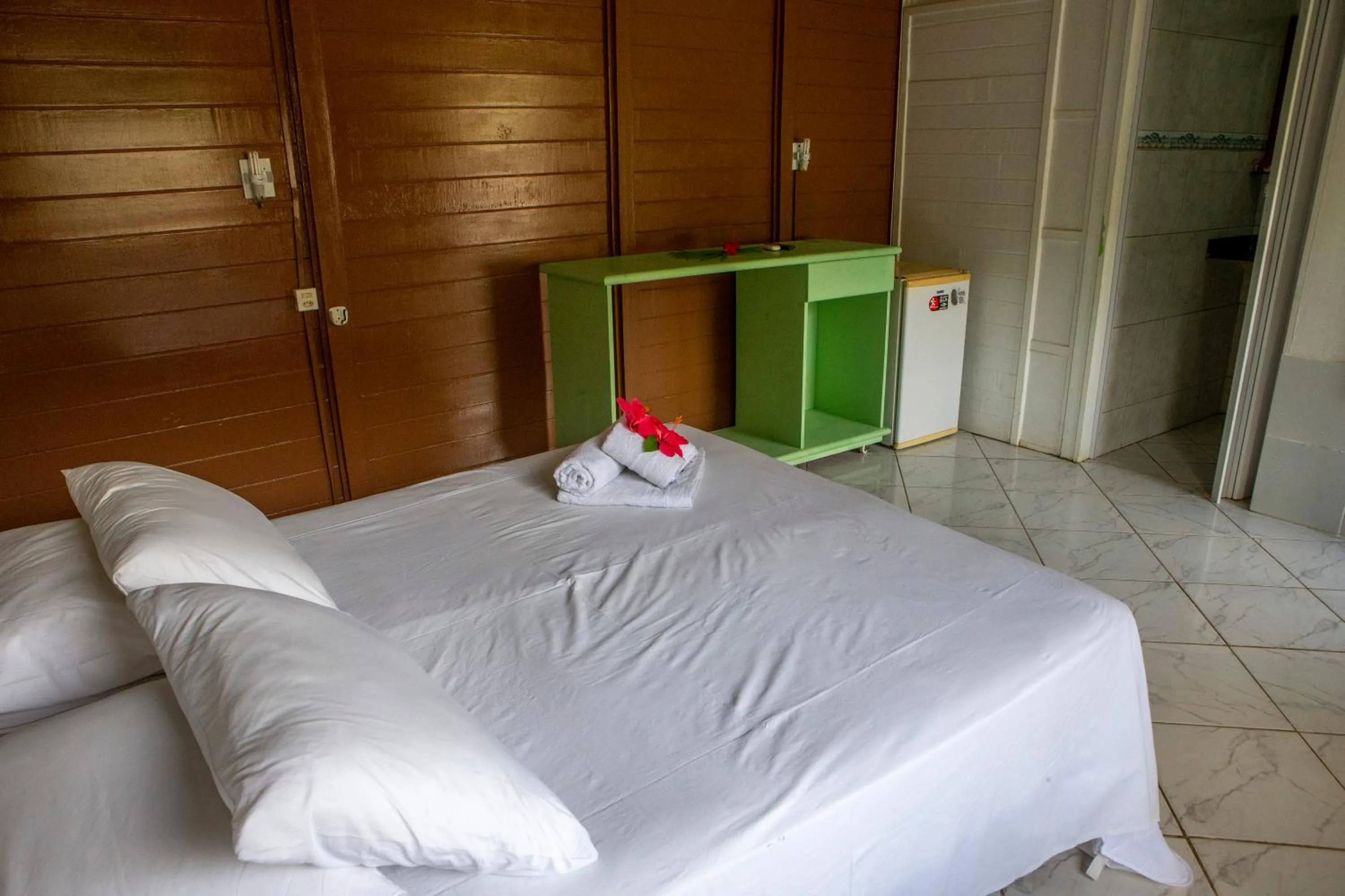 Bed in Pousada Sol e Mar Noronha