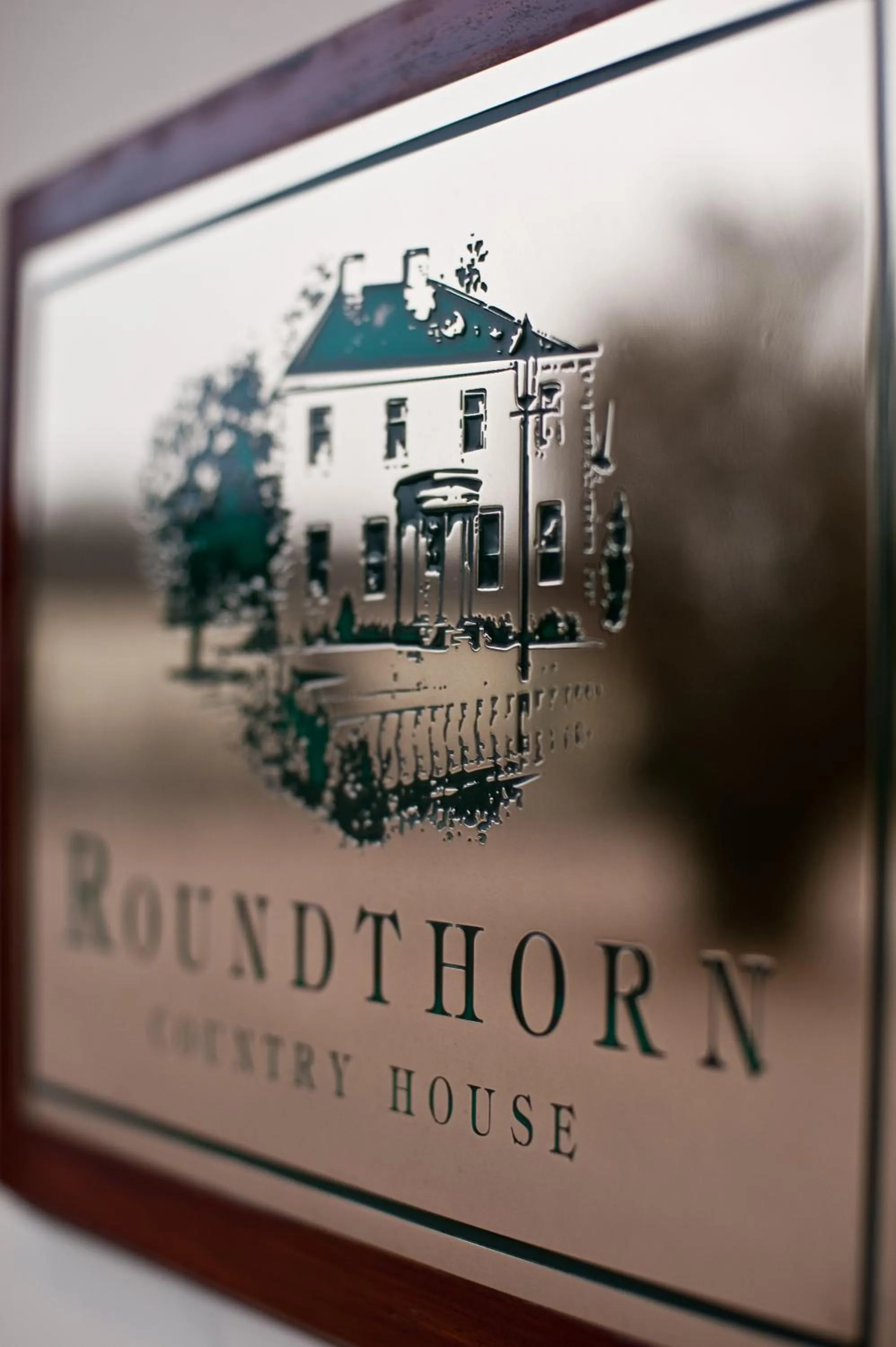 Property logo or sign in Roundthorn Country House & Luxury Apartments