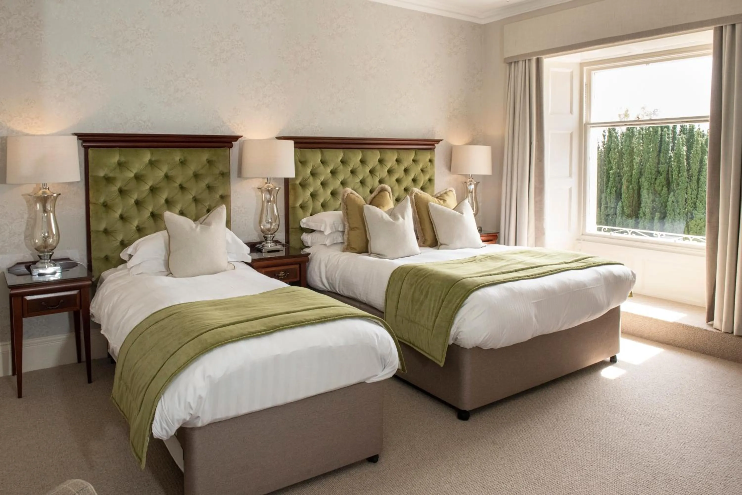 Bed in Roundthorn Country House & Luxury Apartments