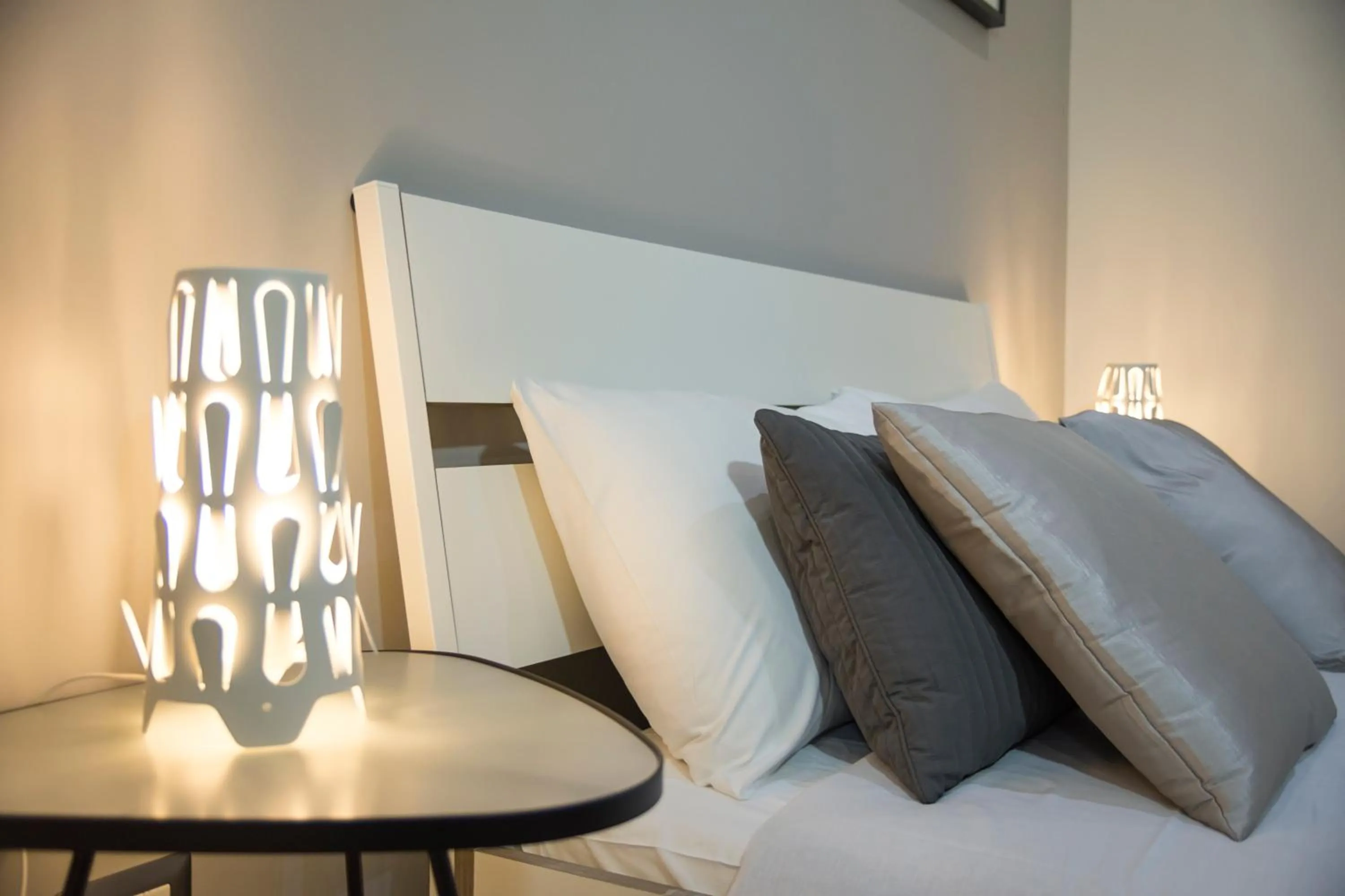 Decorative detail, Bed in Passi di Mare Rooms