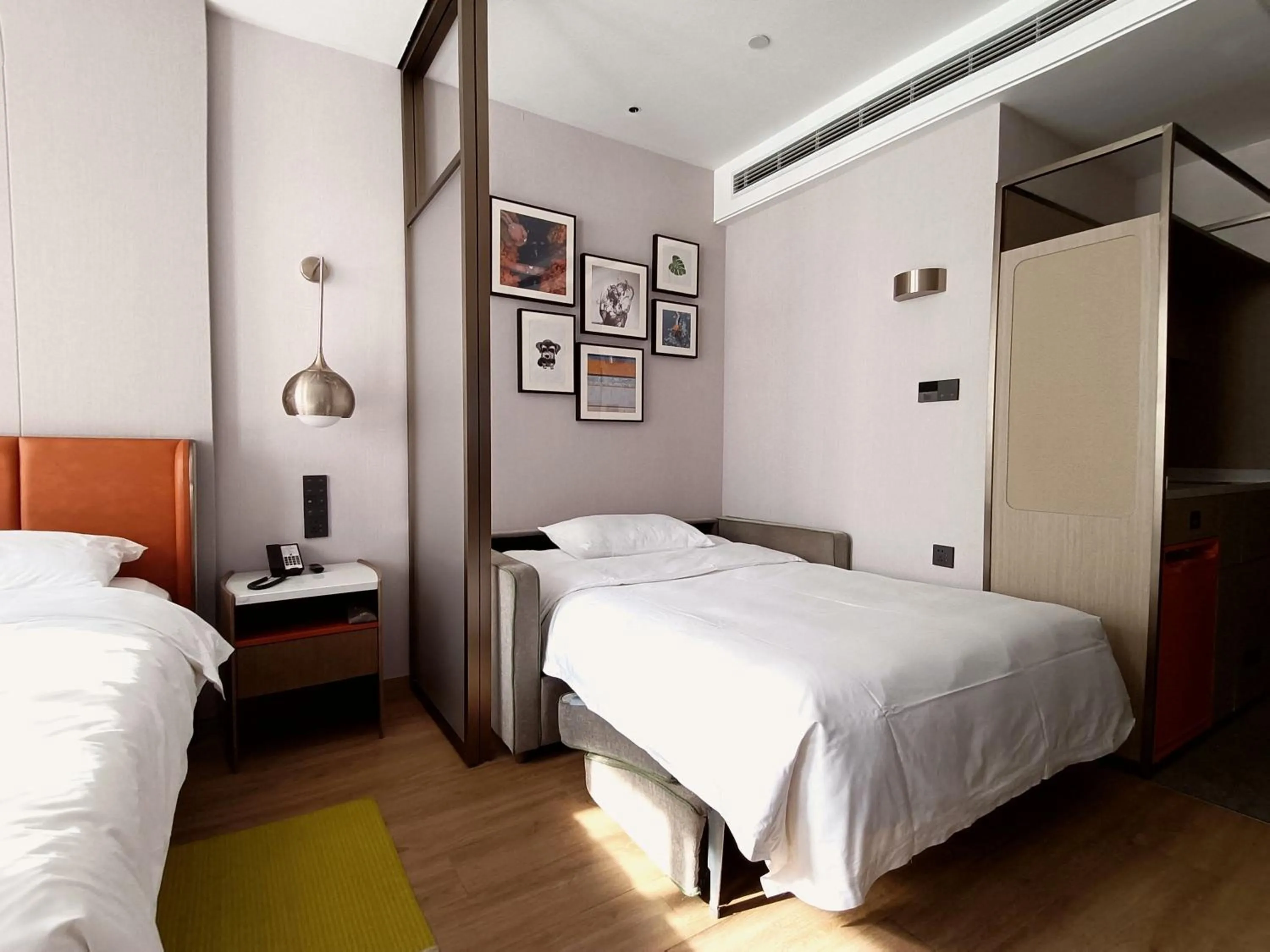 Bed in Home2 Suite by Hilton Hangzhou Qianjiang New Town