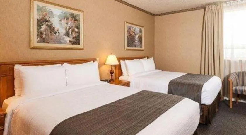 Bed in The Glenmore Inn & Convention Centre