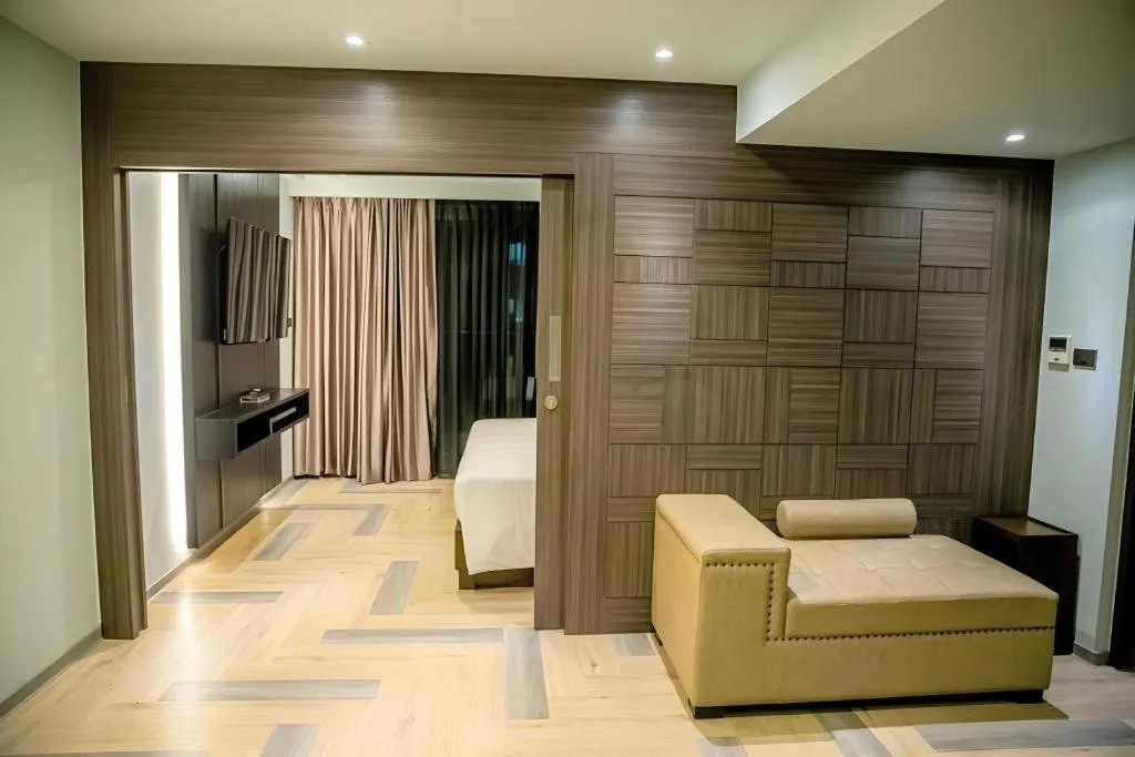 Bed in First Pride Hotel Bangkok