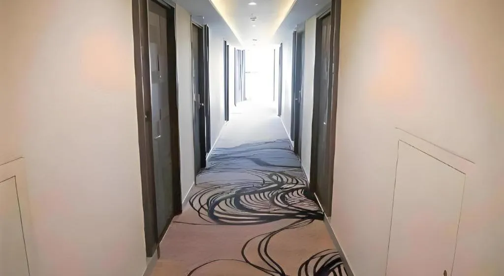 Bed in First Pride Hotel Bangkok