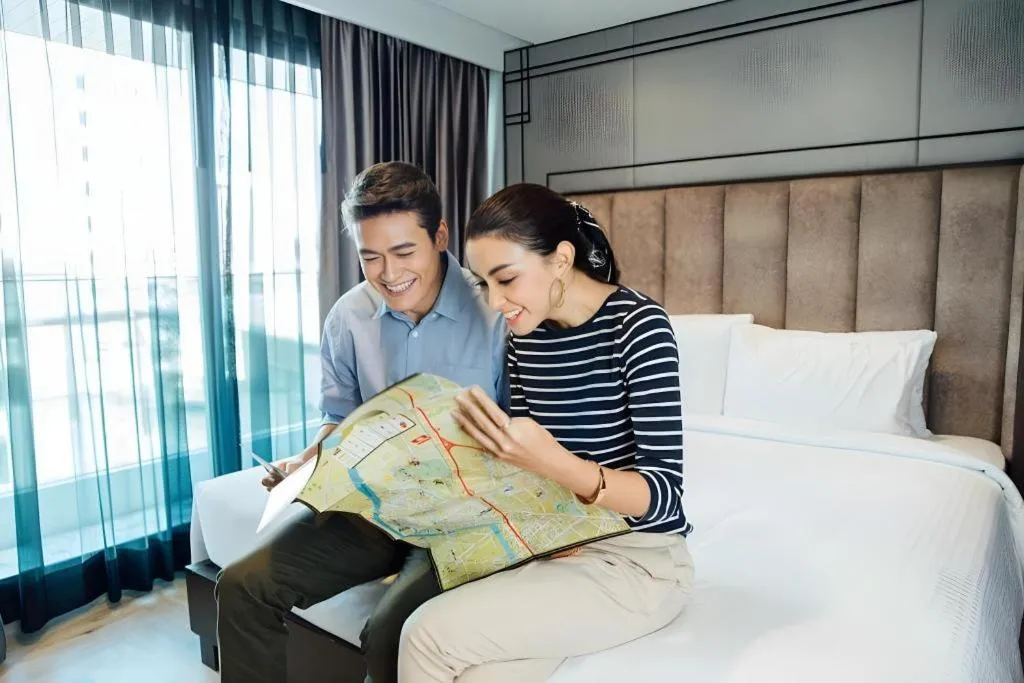 Bed in First Pride Hotel Bangkok