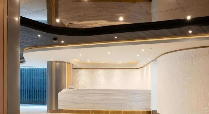 Bed in First Pride Hotel Bangkok