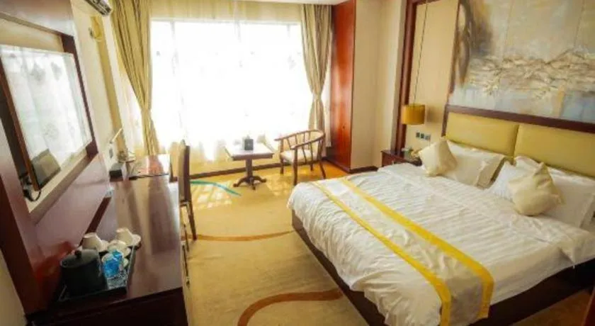 Bed in Grand Szechuan Hotel Vientiane