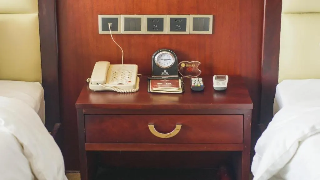 Bed in Grand Szechuan Hotel Vientiane