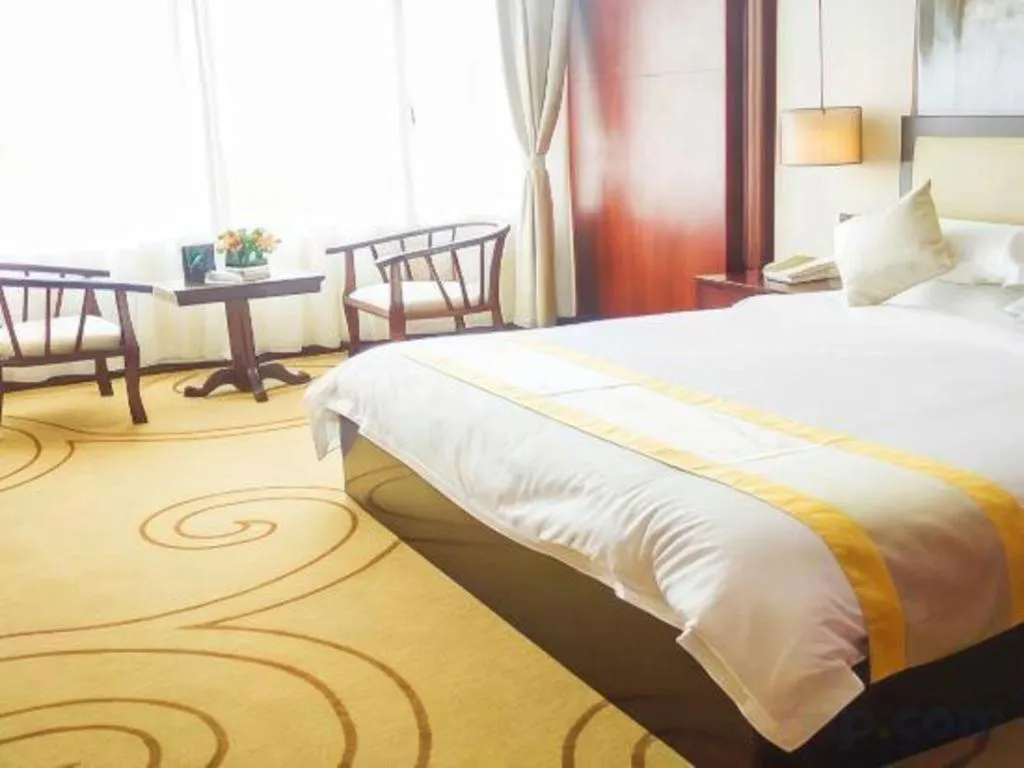 Bed in Grand Szechuan Hotel Vientiane