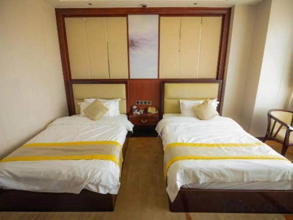 Bed in Grand Szechuan Hotel Vientiane