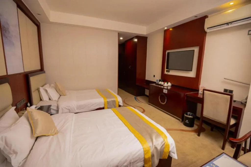 Bed in Grand Szechuan Hotel Vientiane