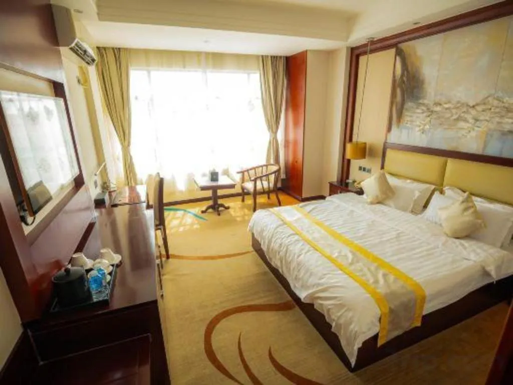 Bed in Grand Szechuan Hotel Vientiane