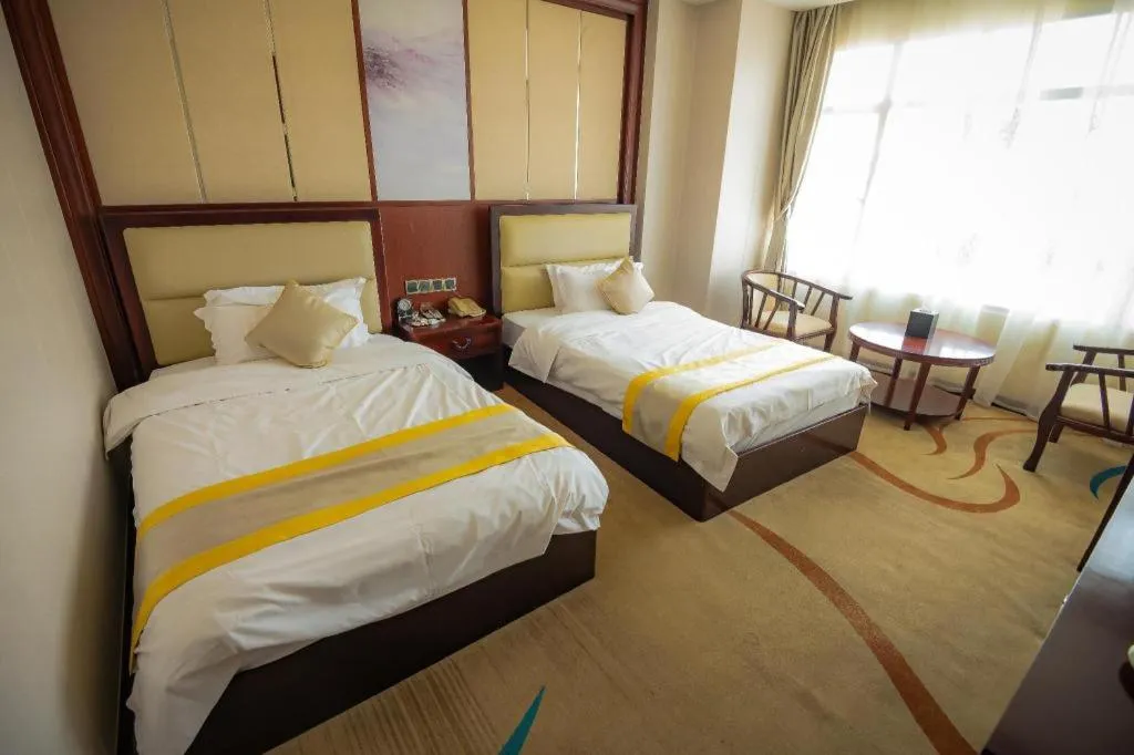 Bed in Grand Szechuan Hotel Vientiane