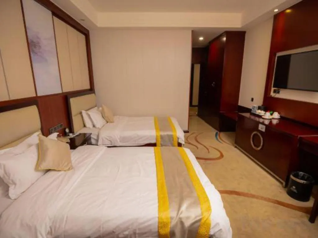 Bed in Grand Szechuan Hotel Vientiane