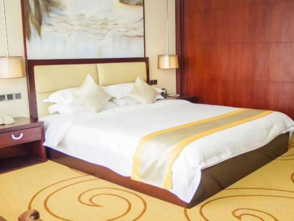 Bed in Grand Szechuan Hotel Vientiane