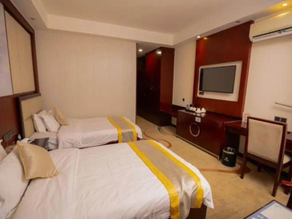 Bed in Grand Szechuan Hotel Vientiane