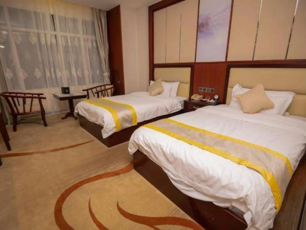 Bed in Grand Szechuan Hotel Vientiane