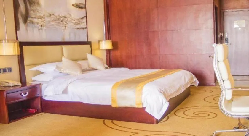 Bed in Grand Szechuan Hotel Vientiane