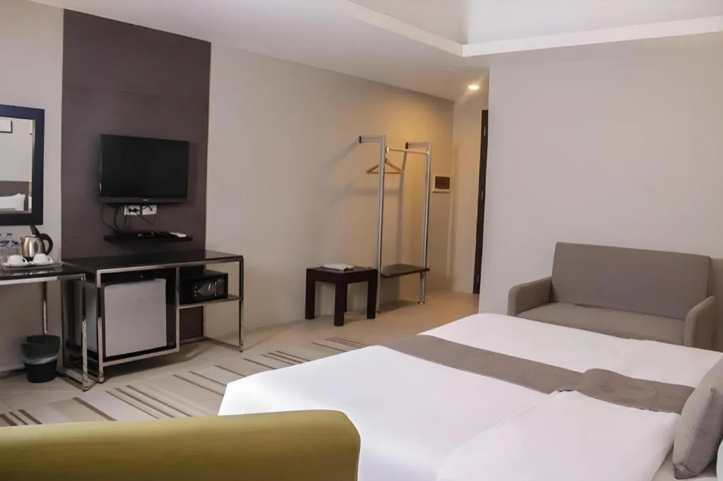 Bed in Sequoia Hotel Quezon City