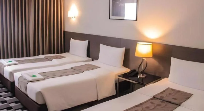 Bed in Sequoia Hotel Quezon City