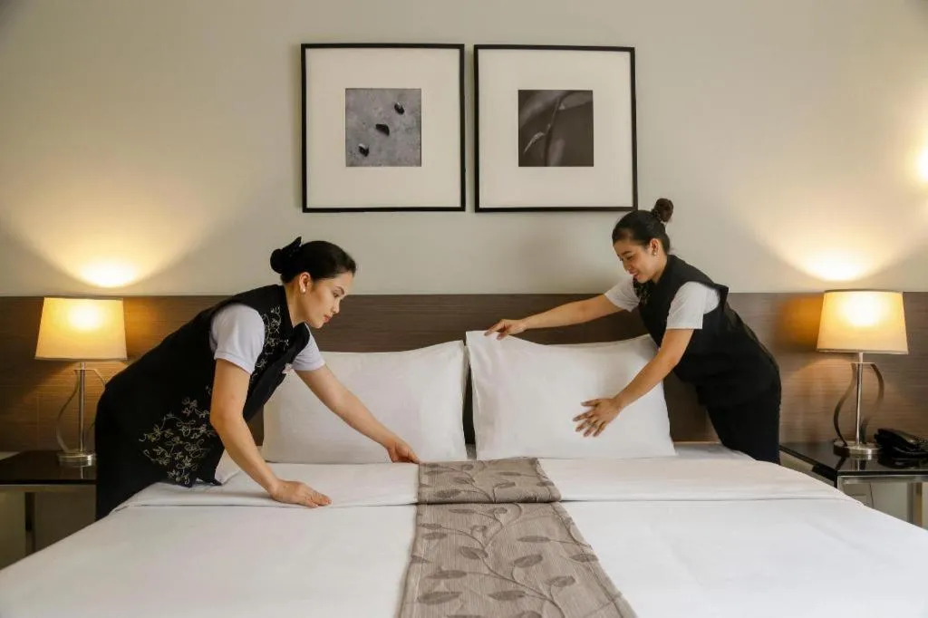 Bed in Sequoia Hotel Quezon City