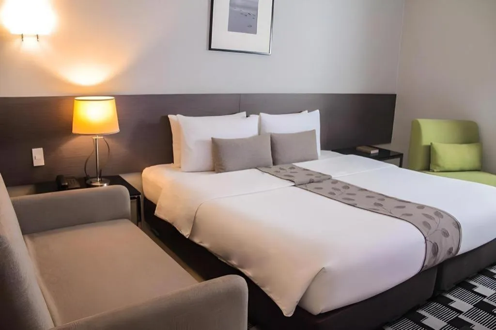 Bed in Sequoia Hotel Quezon City