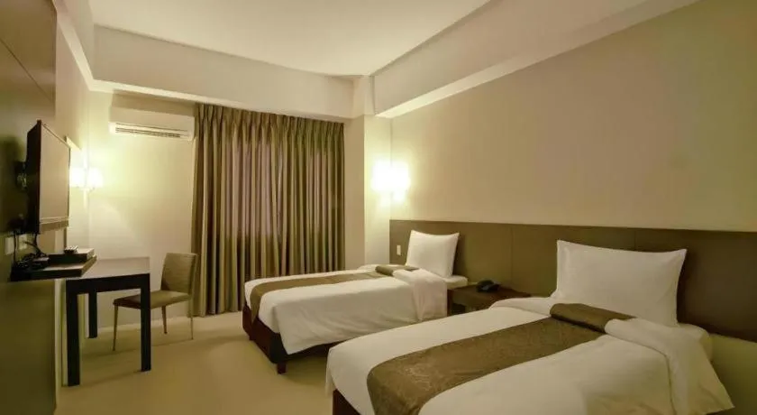 Bed in Sequoia Hotel Quezon City