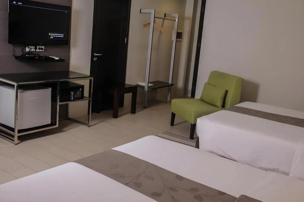 Bed in Sequoia Hotel Quezon City