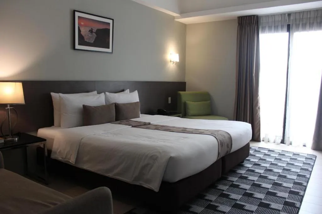 Bed in Sequoia Hotel Quezon City