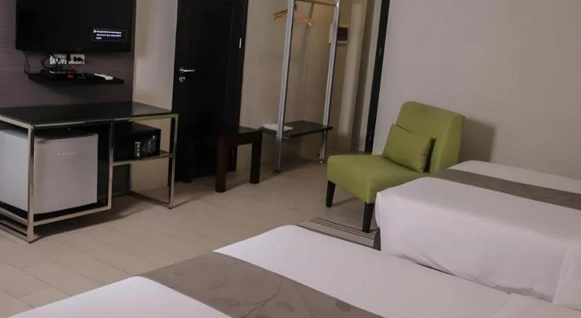 Bed in Sequoia Hotel Quezon City