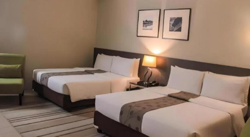 Bed in Sequoia Hotel Quezon City