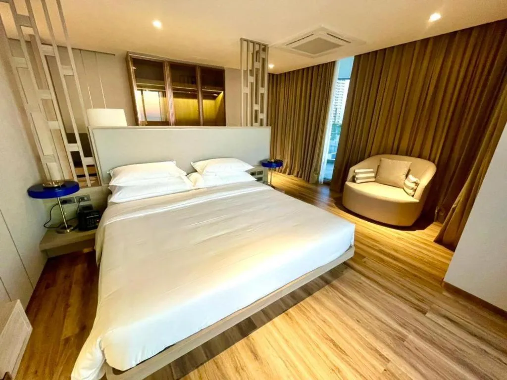 Bed in Symphony of The Sea Hotel