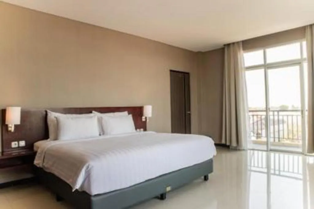 Bed in Karlita Hotel Tegal