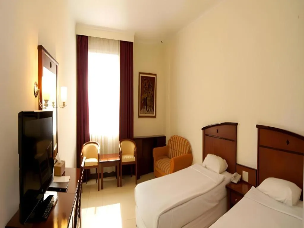 Bed in Karlita Hotel Tegal