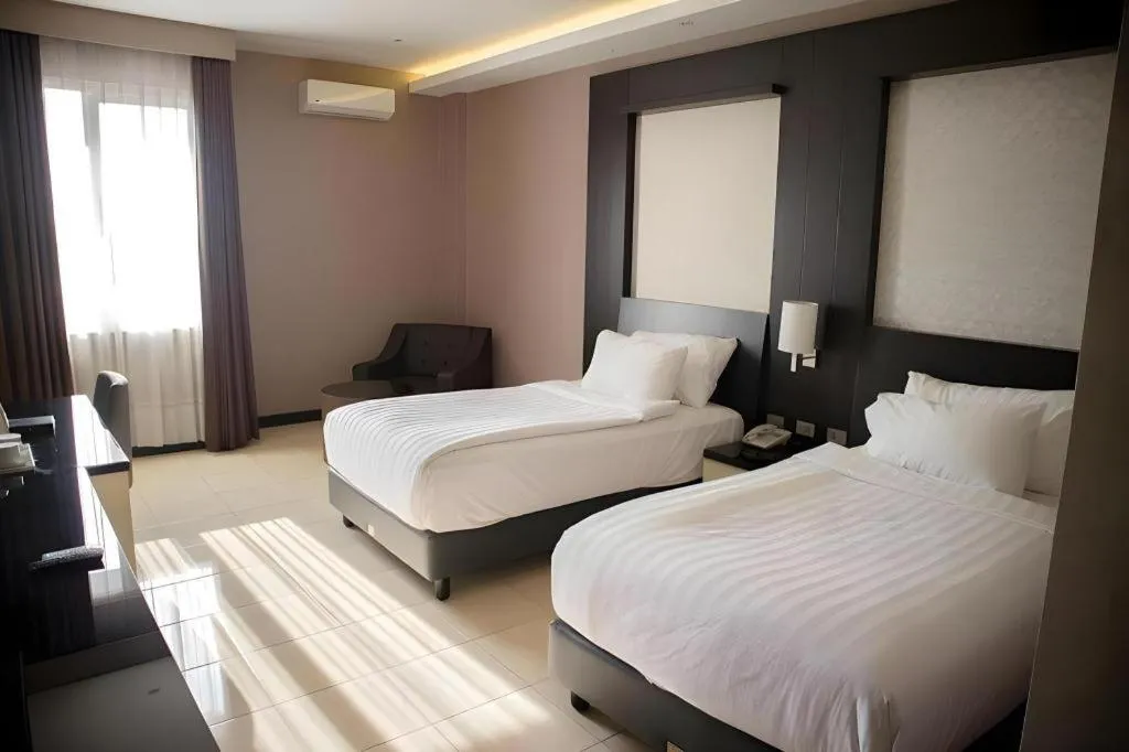 Bed in Karlita Hotel Tegal