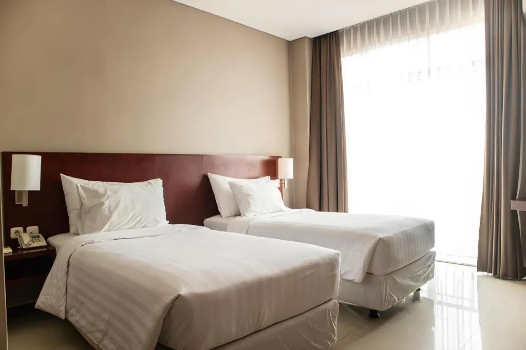 Bed in Karlita Hotel Tegal