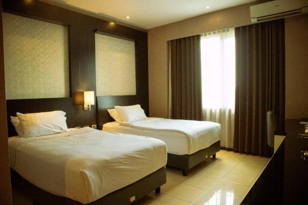 Bed in Karlita Hotel Tegal
