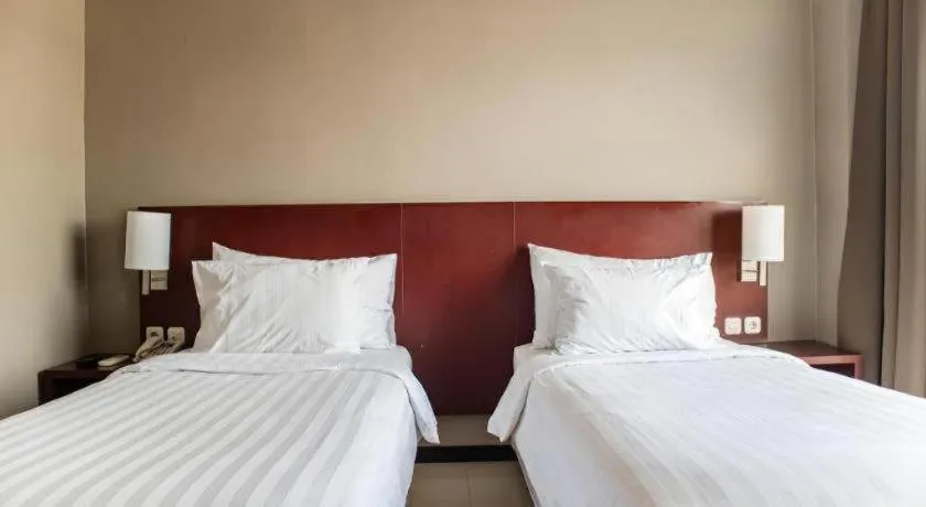 Bed in Karlita Hotel Tegal