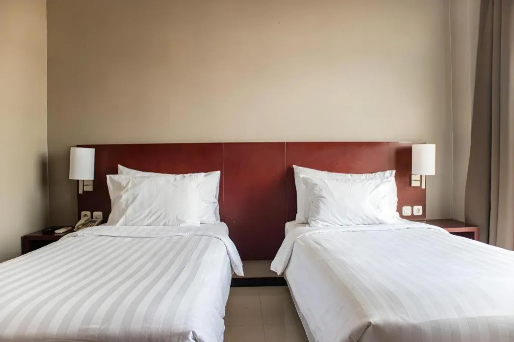 Bed in Karlita Hotel Tegal