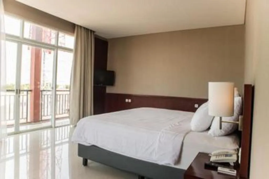 Bed in Karlita Hotel Tegal