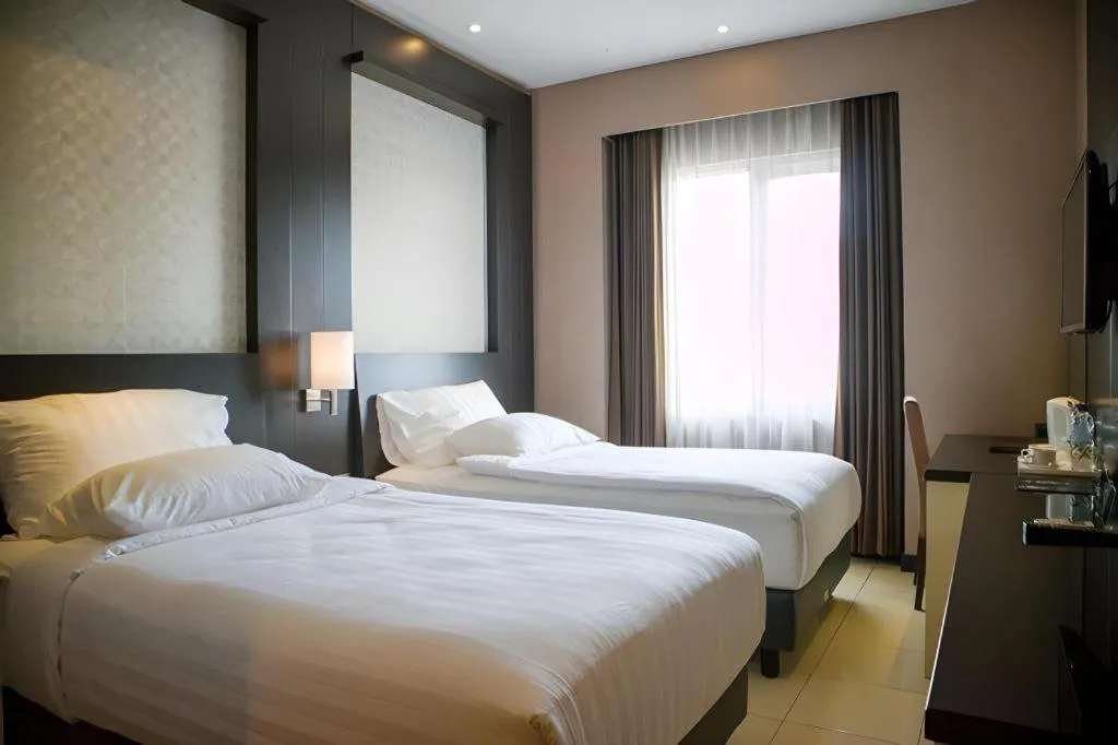 Bed in Karlita Hotel Tegal