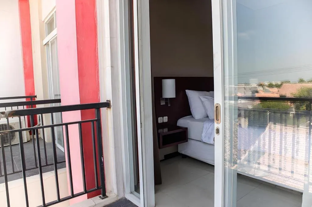 Bed in Karlita Hotel Tegal