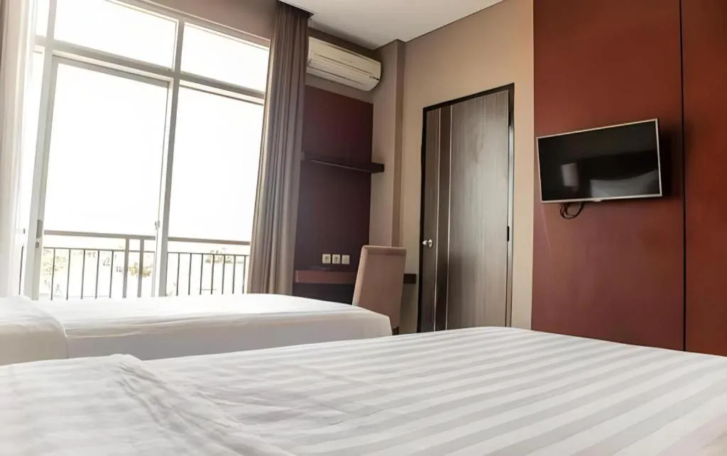 Bed in Karlita Hotel Tegal