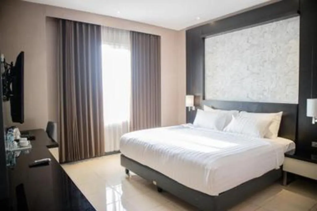 Bed in Karlita Hotel Tegal