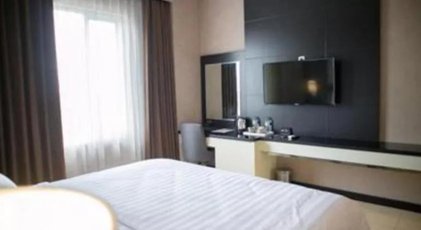 Bed in Karlita Hotel Tegal