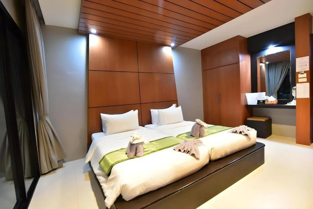 Bed in The Breeze Lipe Resort