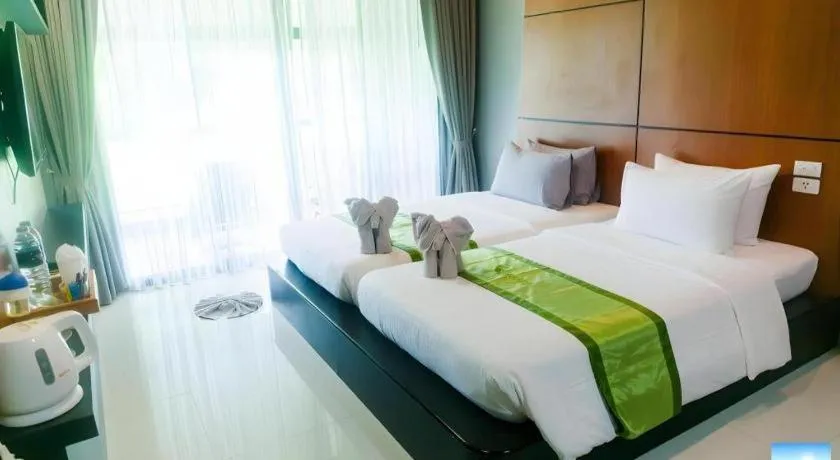 Bed in The Breeze Lipe Resort